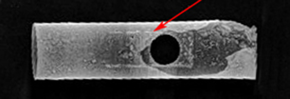 Radiograph of round tube section showing rectangular shadow