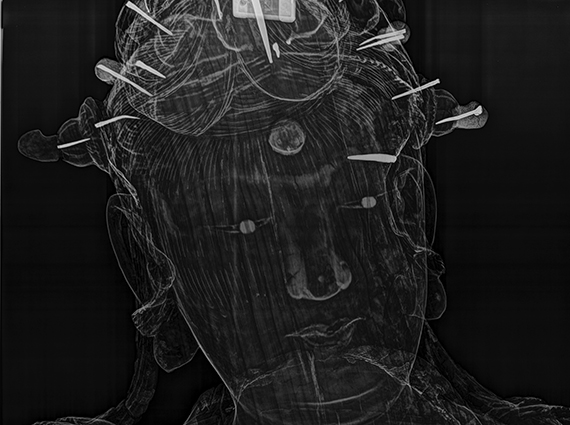 x-ray indicating sculpture's eyes made of glass beads