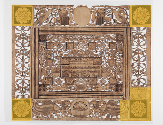 Four corners of Judaica papercut highlighted in yellow