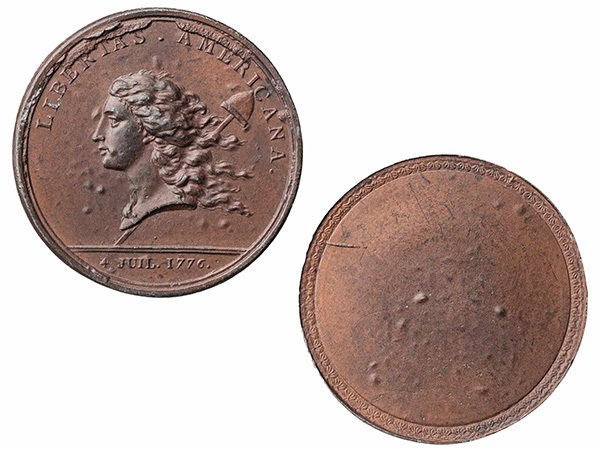 The obverse and reverse of a coin. Obverse: a woman in profile with flowing wavy hair. Reverse: blank border.