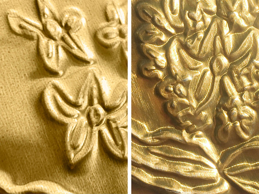 details of flower patterns drawn on the foil, showing both front and back sides