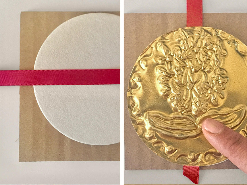 glueing ribbon to the back of the coaster to create hanging banner of coins