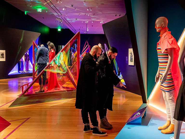 two people looking at art