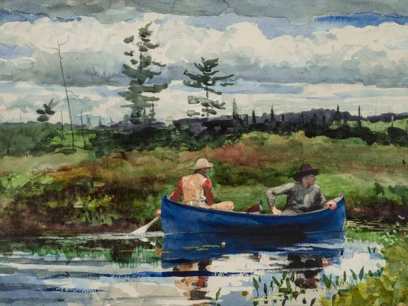 Two men sit in a blue rowboat that sits on still water amid a grassy landscape.