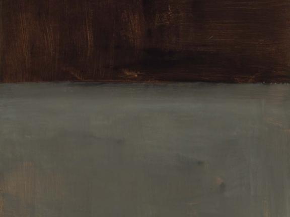 A dark brown block of color atop a light brown block of color.