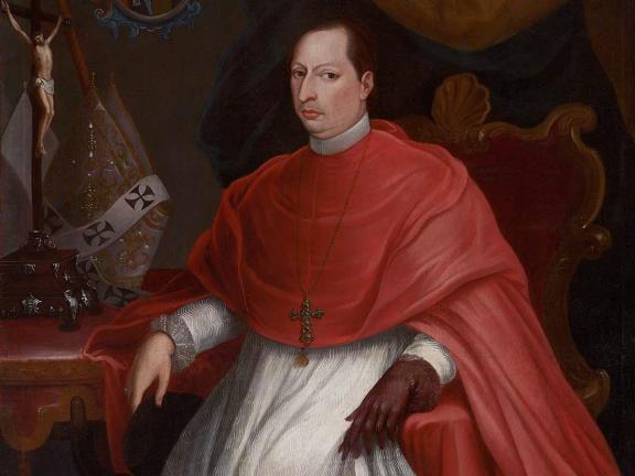A clergyman in red robes.
