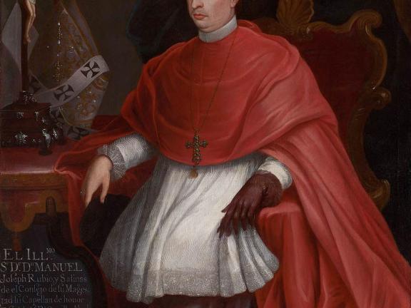 A clergyman in red robes.