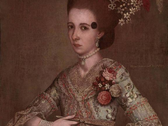 A painting of a woman in an ornately decorated dress.