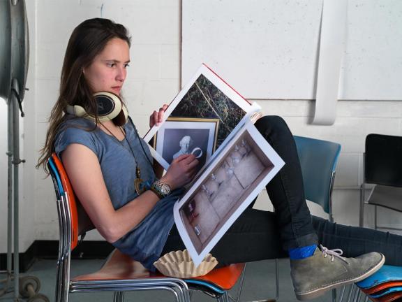 Matthew Monteith, Alejandra Carles-Tolra with Adam Bartos's Yard Sale Photographs book, MassArt, 2013