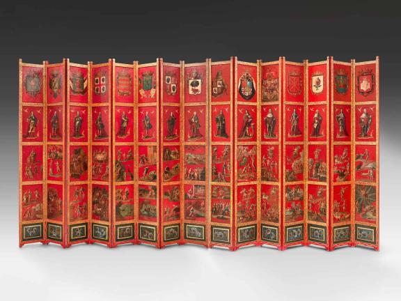 large, red, wooden screens, depicting various nature scenes