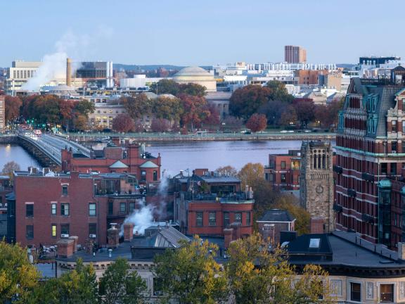 View of domed building in MIT and Cambridge across the Charles River from Boston