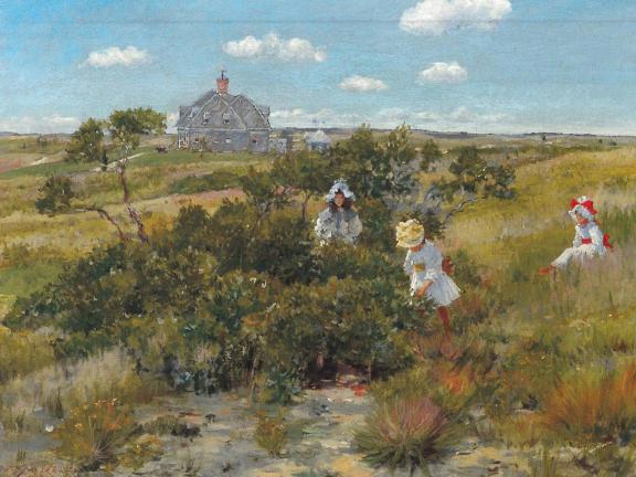 Women picking berries near the sea