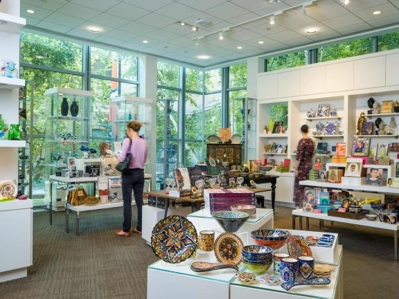 Visitors shopping inside Museum Bookstore and Shop