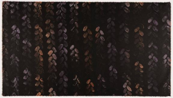 A recurring pattern in dark brown and black that looks like braided hair.