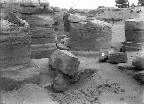 Black-and-white photo of an excavation site in Sudan with ancient Egyptian ruins.
