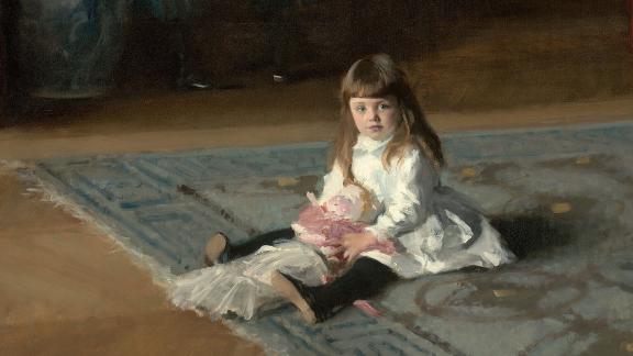 detail of painting depicting young child in white dress, sitting on rug and holding doll