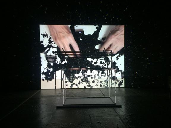 View of Joan Jonas' Ice Drawing video and sculpture installation inside gallery space