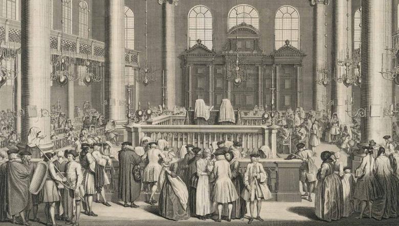 A crowd gathered in a synagogue.