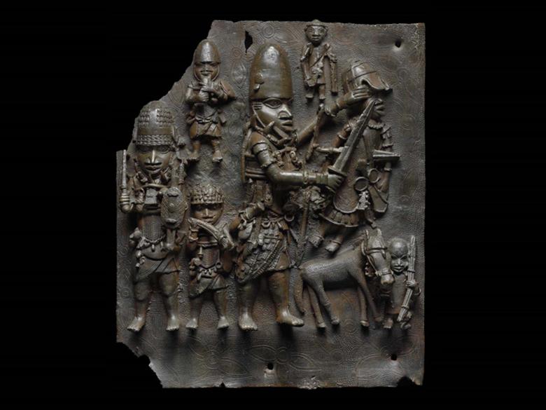 Copper relief plaque of men in various sizes, all in armor holding weapons